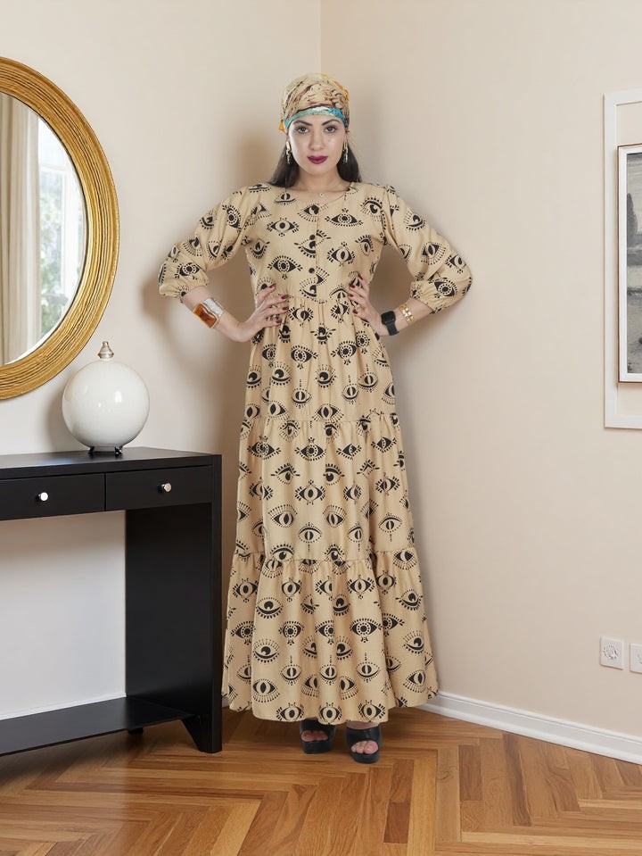 Elegant Maxi Dress Light Sand Tone with Black Printed Eye Patterns | Modest & Trendy Women’s Fashion KSA